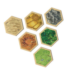 Hexagonal game tiles with different landscapes on a white background
